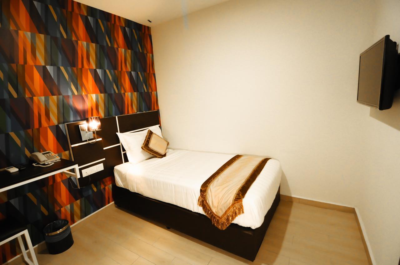 K Garden Hotel Parit Buntar Pokoj fotografie